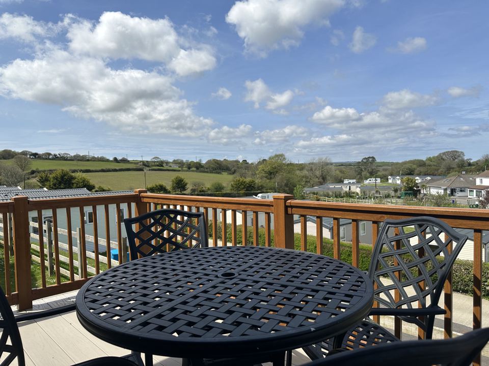Deck table with countryside view