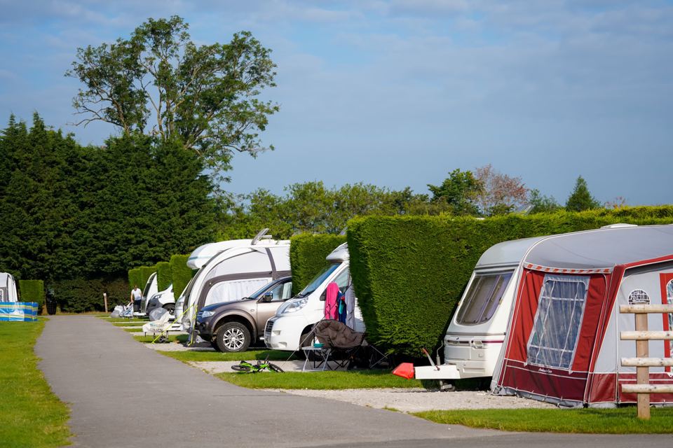 Hedged hardstanding touring pitches