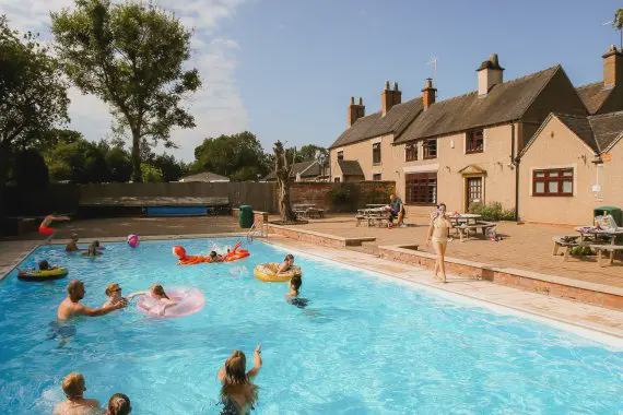 Outdoor pool beside the main house