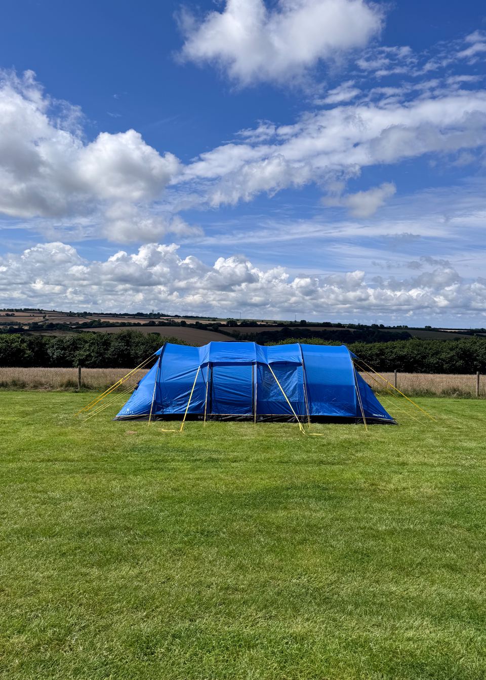 Blue tent on the grass pitch
