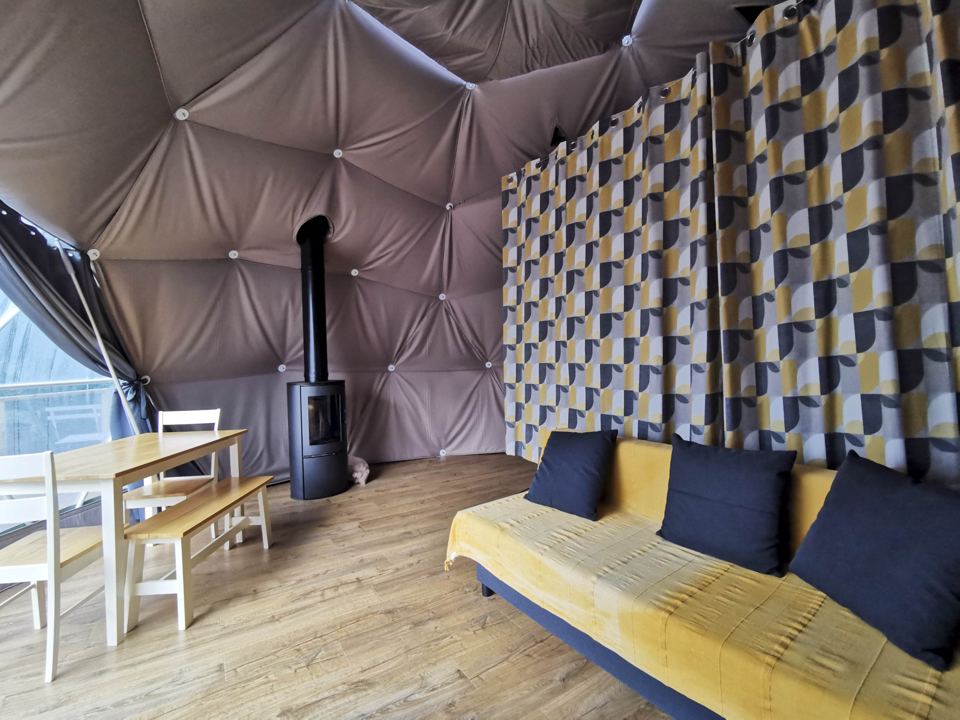 Dome interior with futon and table