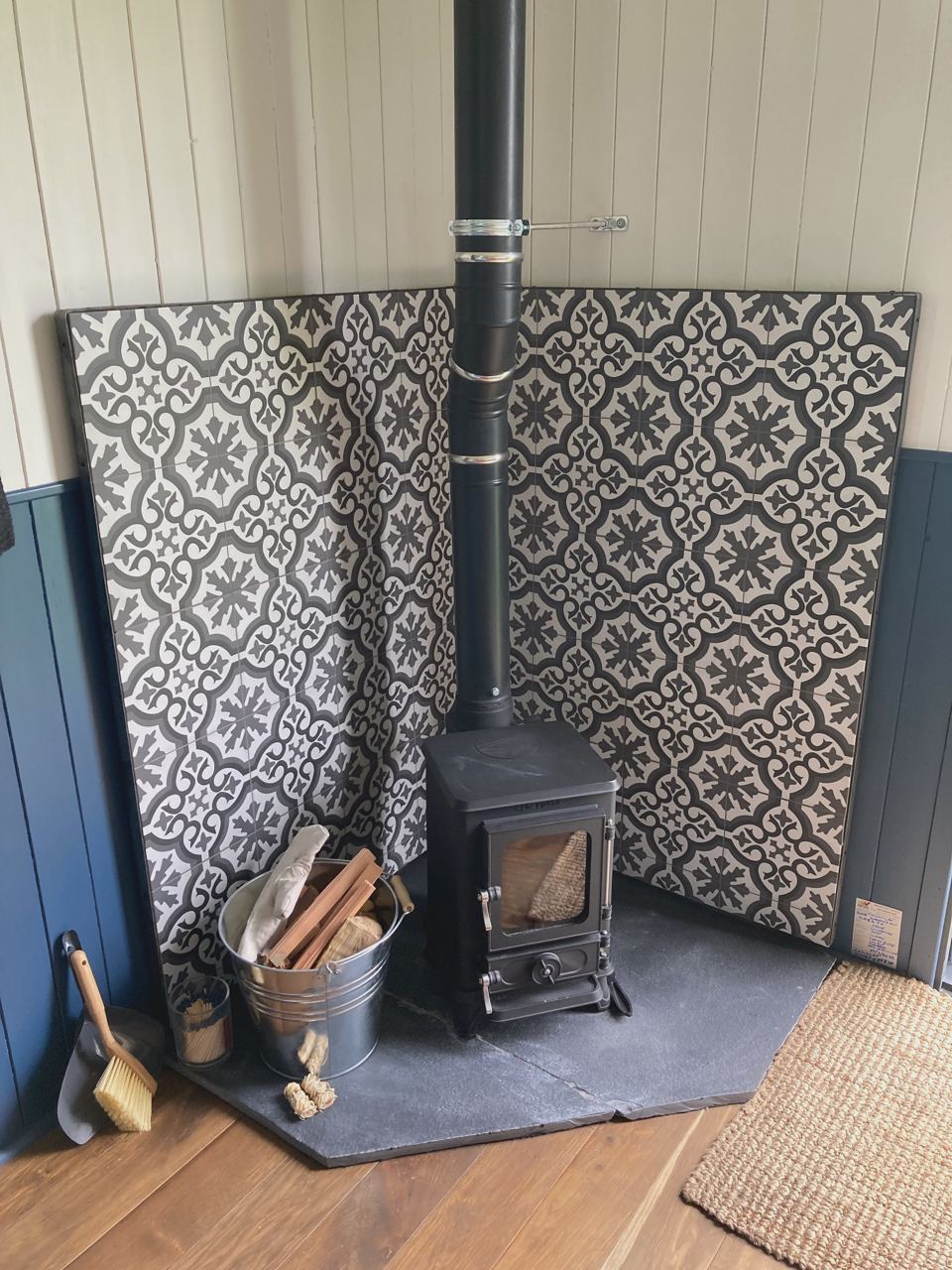 Inside the hut by the wood burner