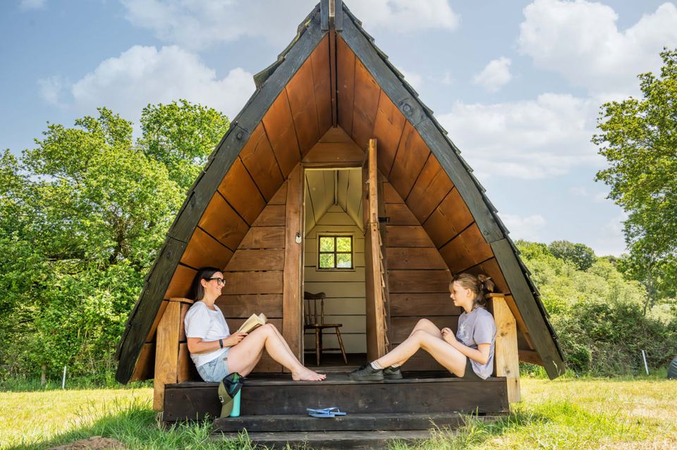 Camping pod with open front