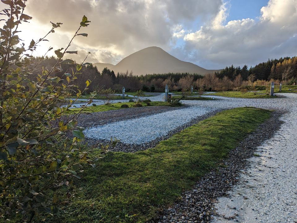 Gravel pitch with mountain beyond