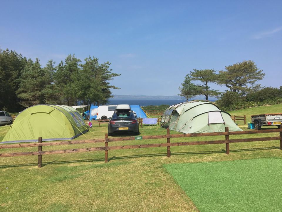 Tent pitches above the sea