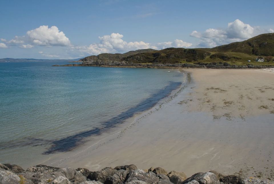 Sandy bay near the site