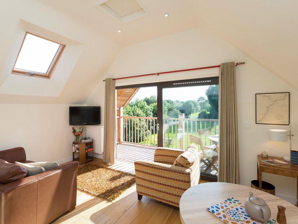 Living room opening to balcony