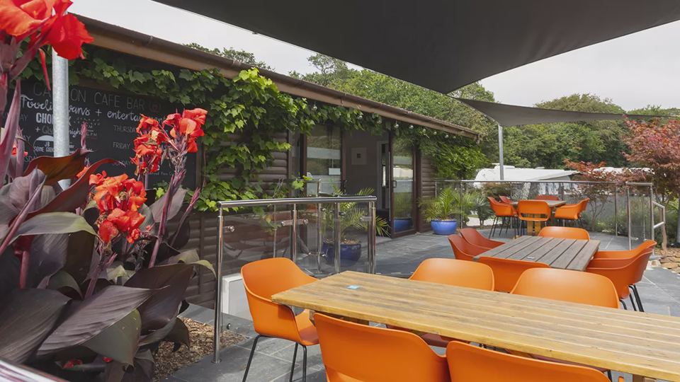 Outdoor seating with orange chairs