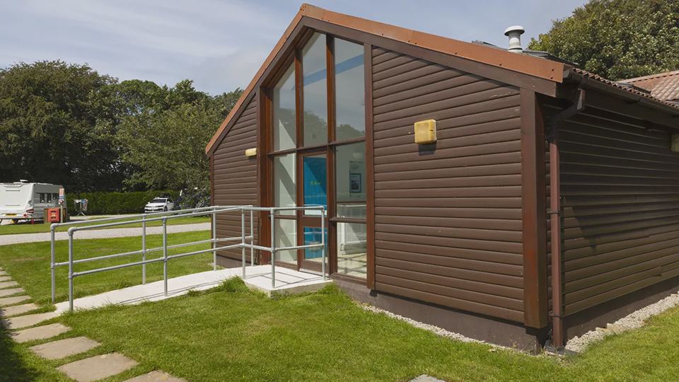 Cabin exterior with glazed gable