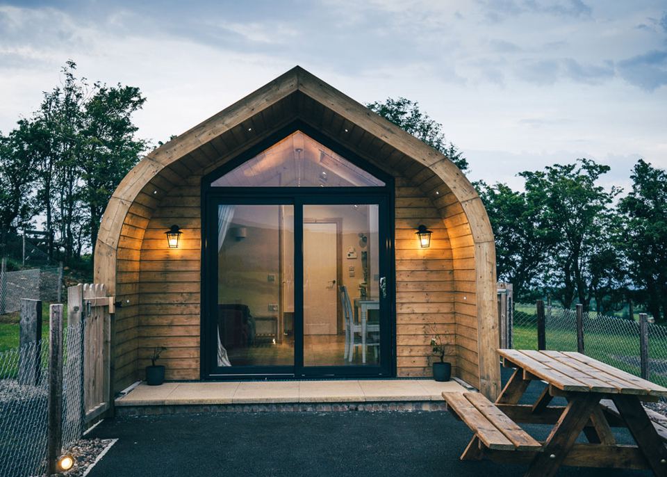 Timber cabin with picnic bench