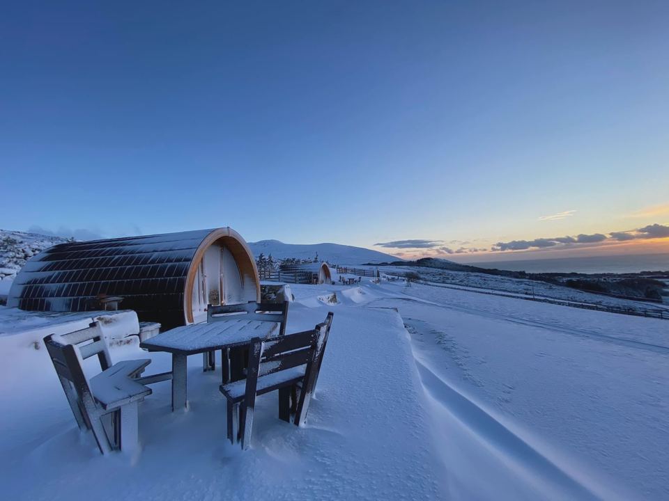 Snowy pod and patio