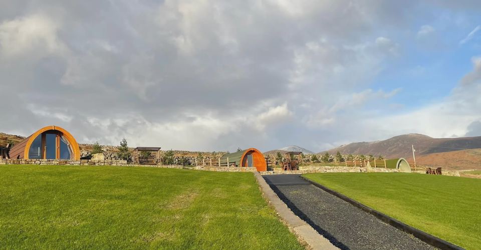 Row of pods with mountain behind