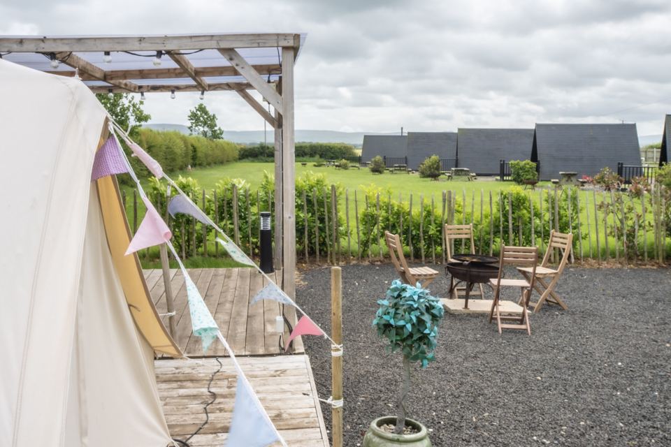 Bell tent deck and fire pit