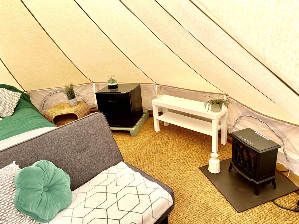 Bell tent with wood burner