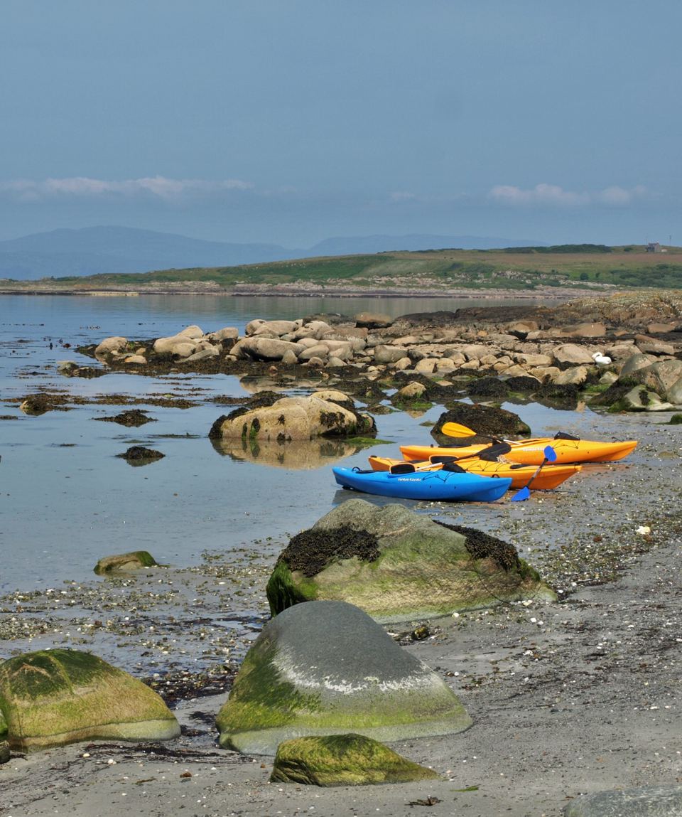 Kayaks on the loch shore