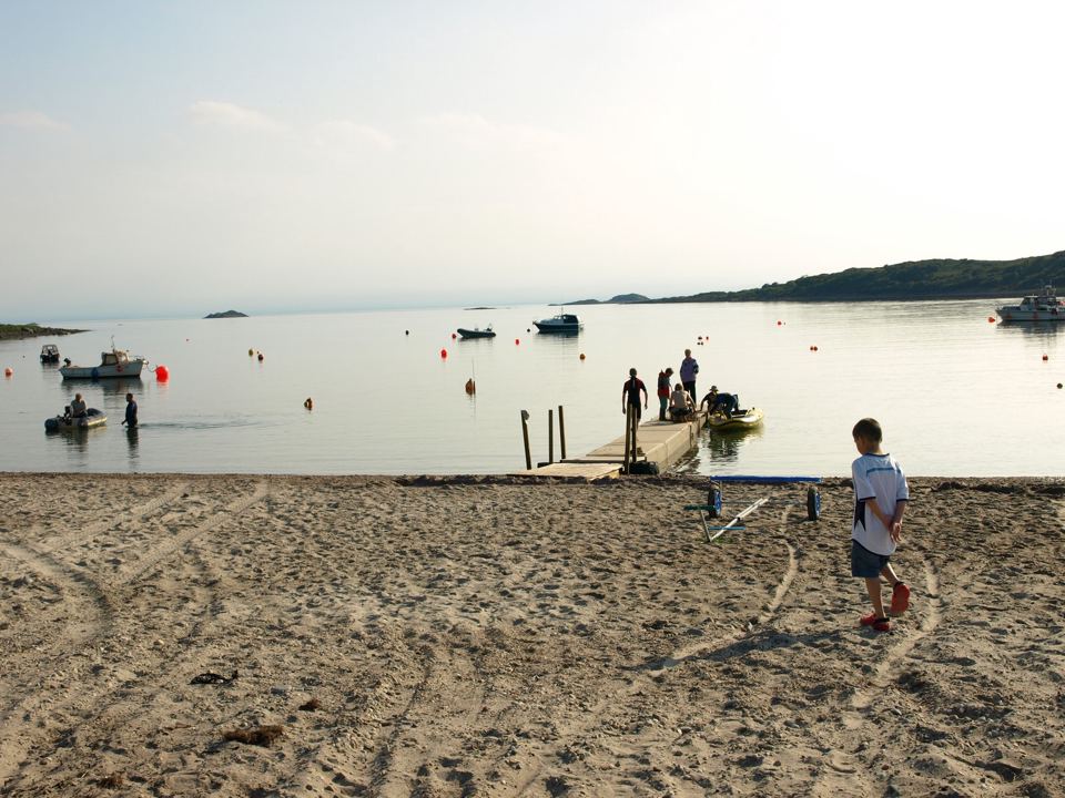Sandy beach and jetty