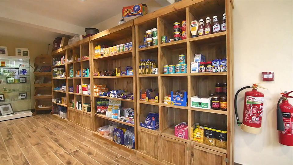Shop shelves stocked with supplies