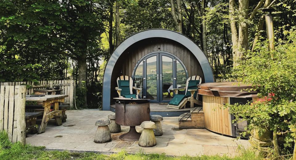 Timber pod with hot tub