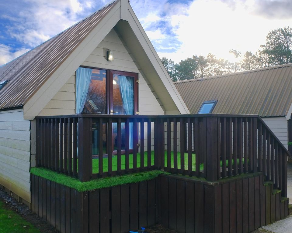 Lodge with decked balcony