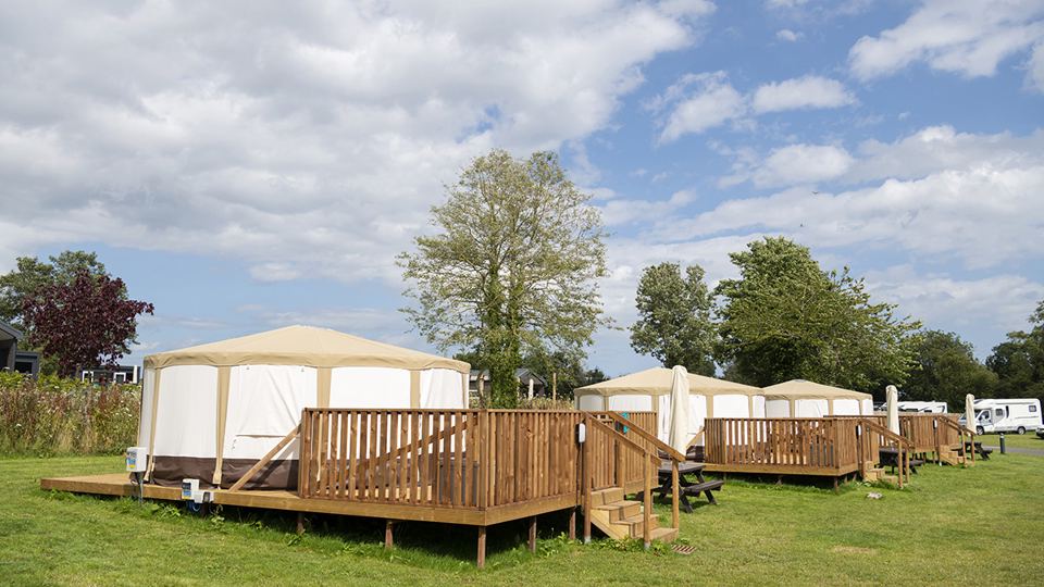 Glamping tents on decking