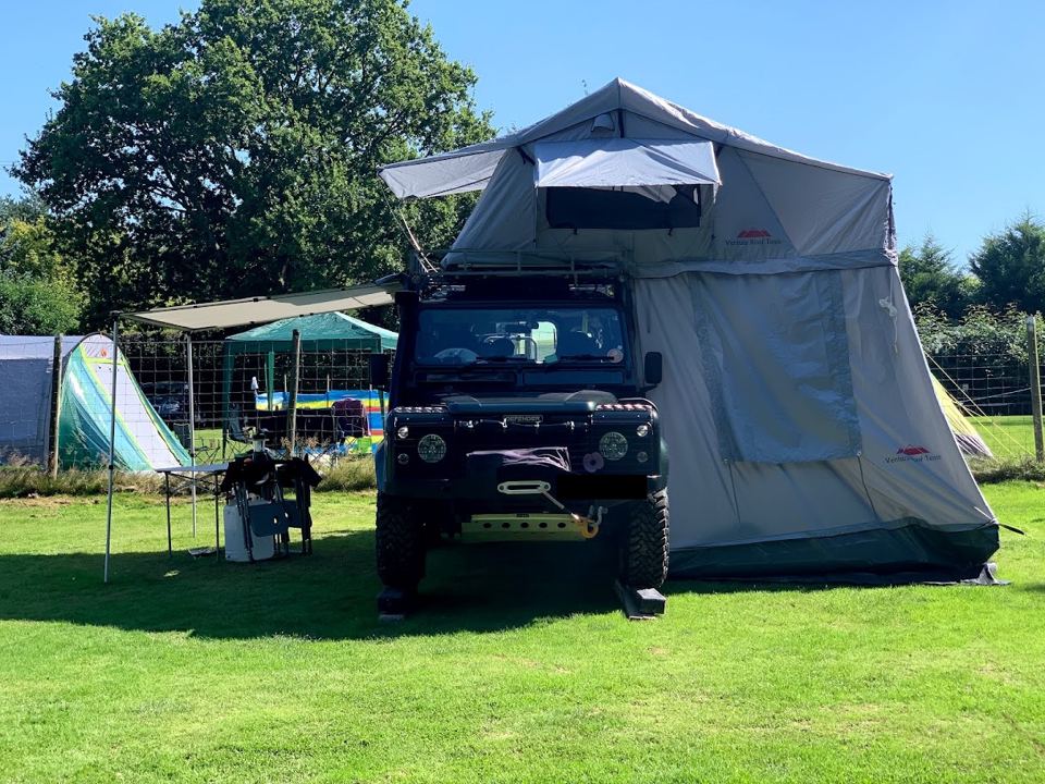 Roof tent on the grass
