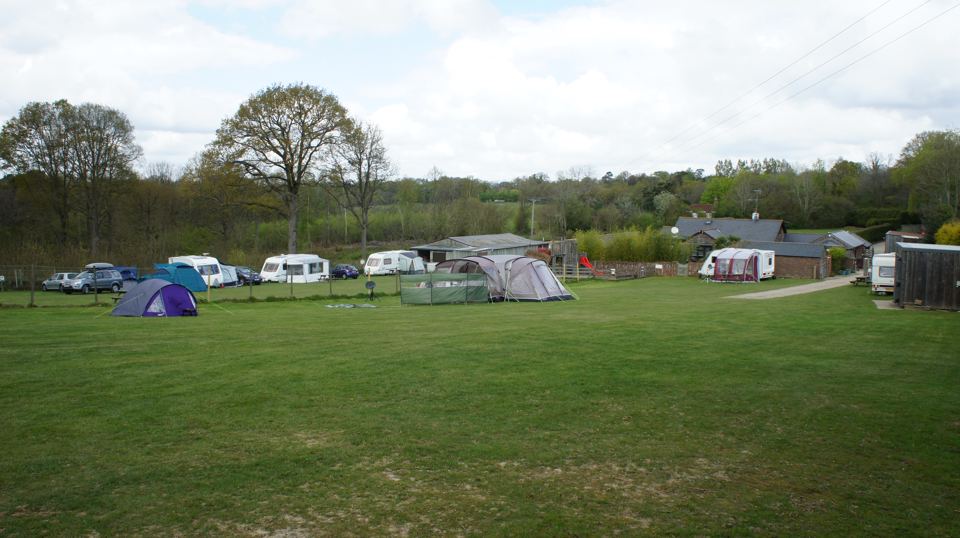 Tents and vans across the field