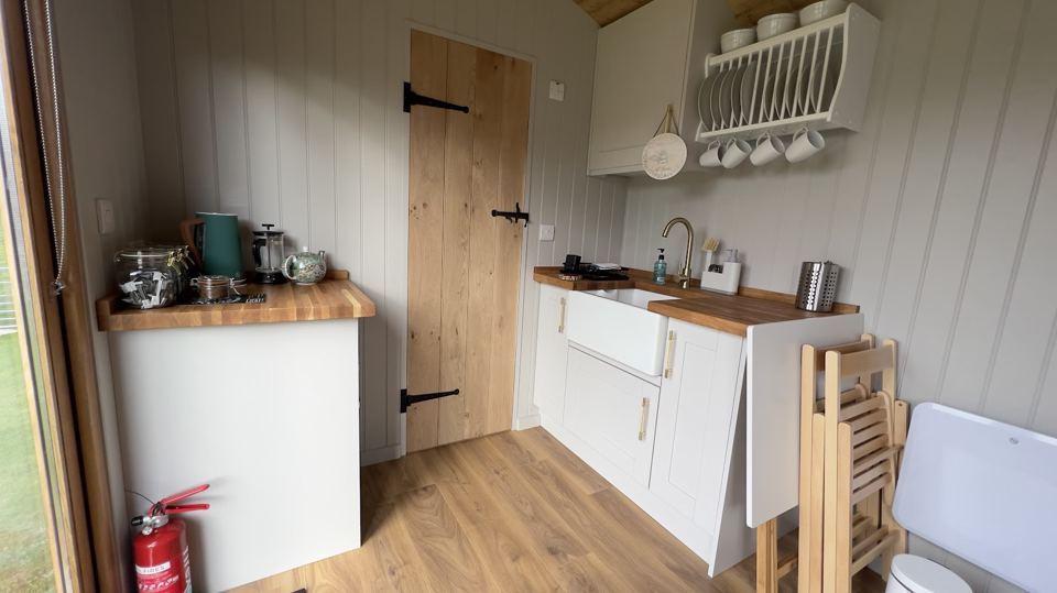 Kitchen inside the shepherd's hut
