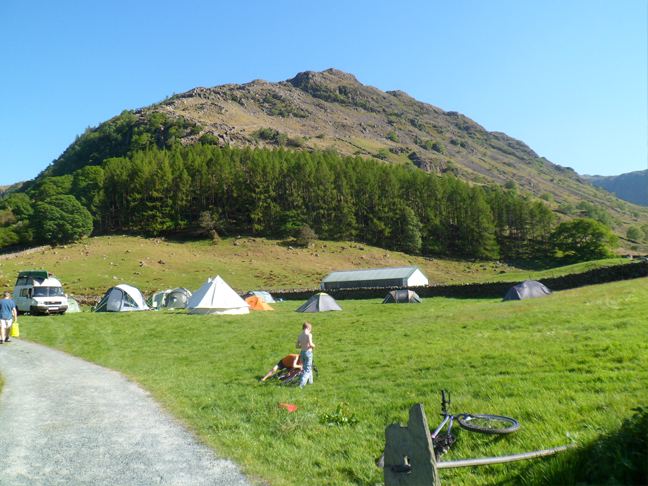 Tents below the hillside
