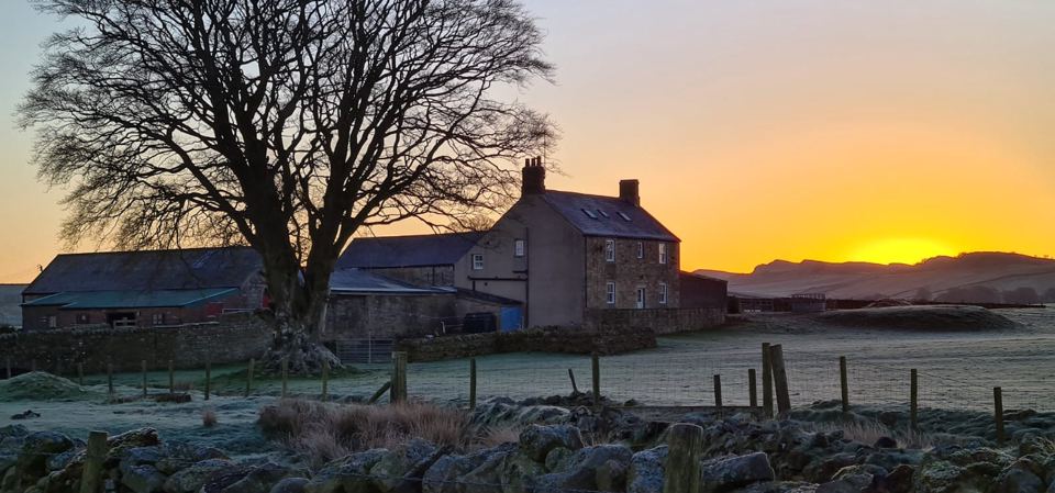 Farmhouse at sunrise