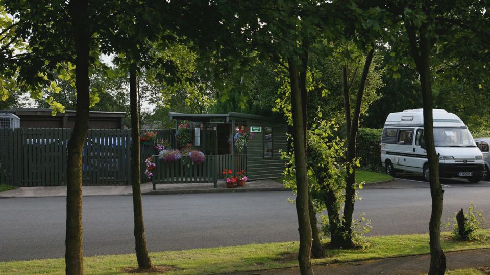 Motorhome beside the site buildings