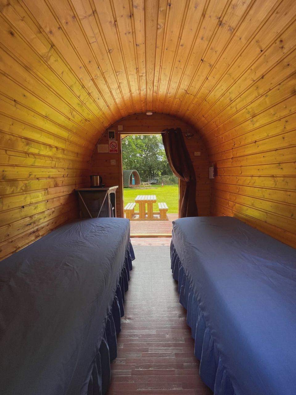 Pod with beds and door open