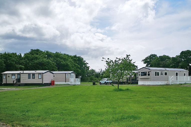 Static caravans across grass