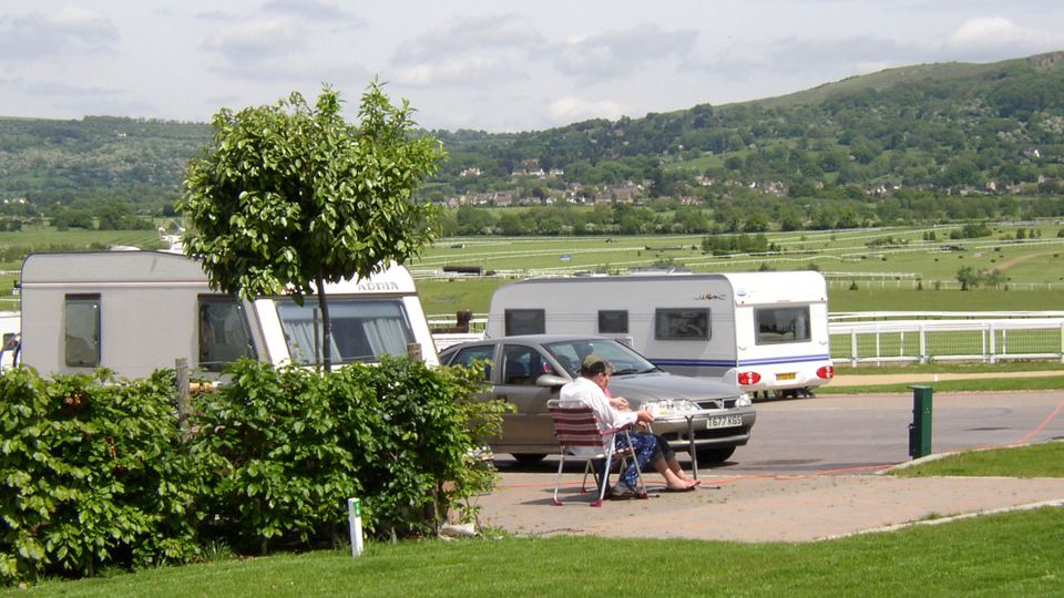 Caravans beside the racecourse rail