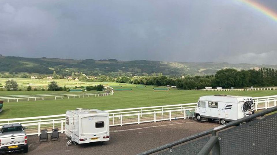 Pitches with hills beyond