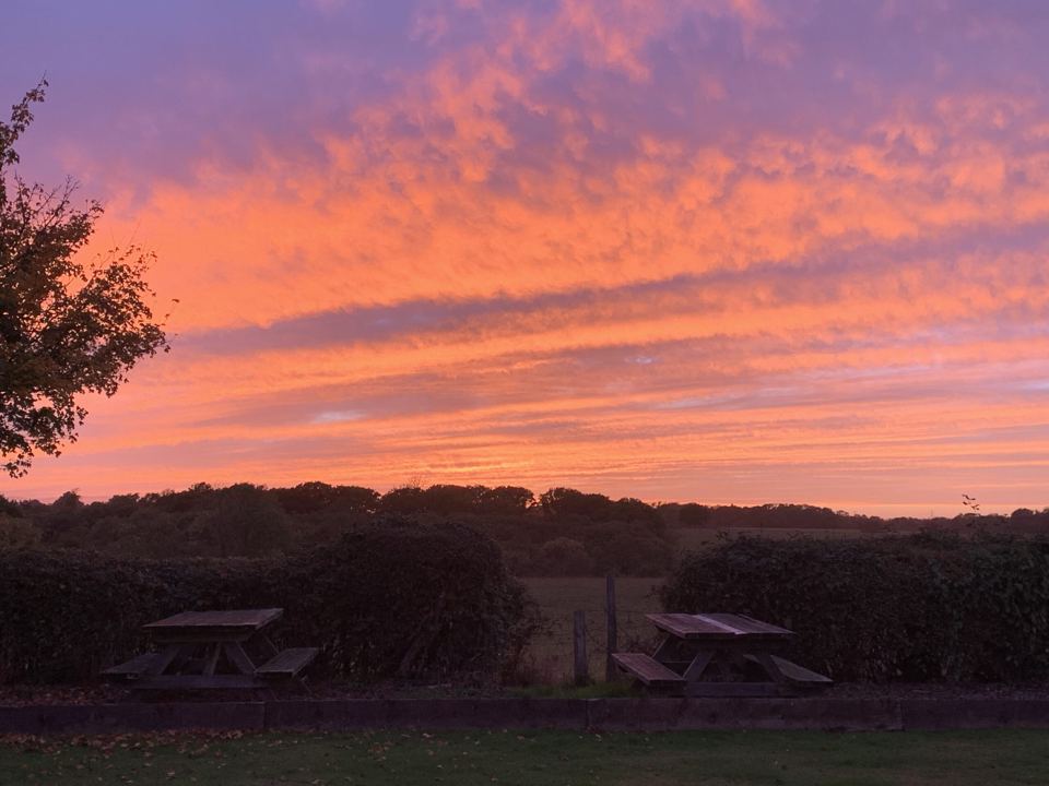 Sunset over the picnic tables