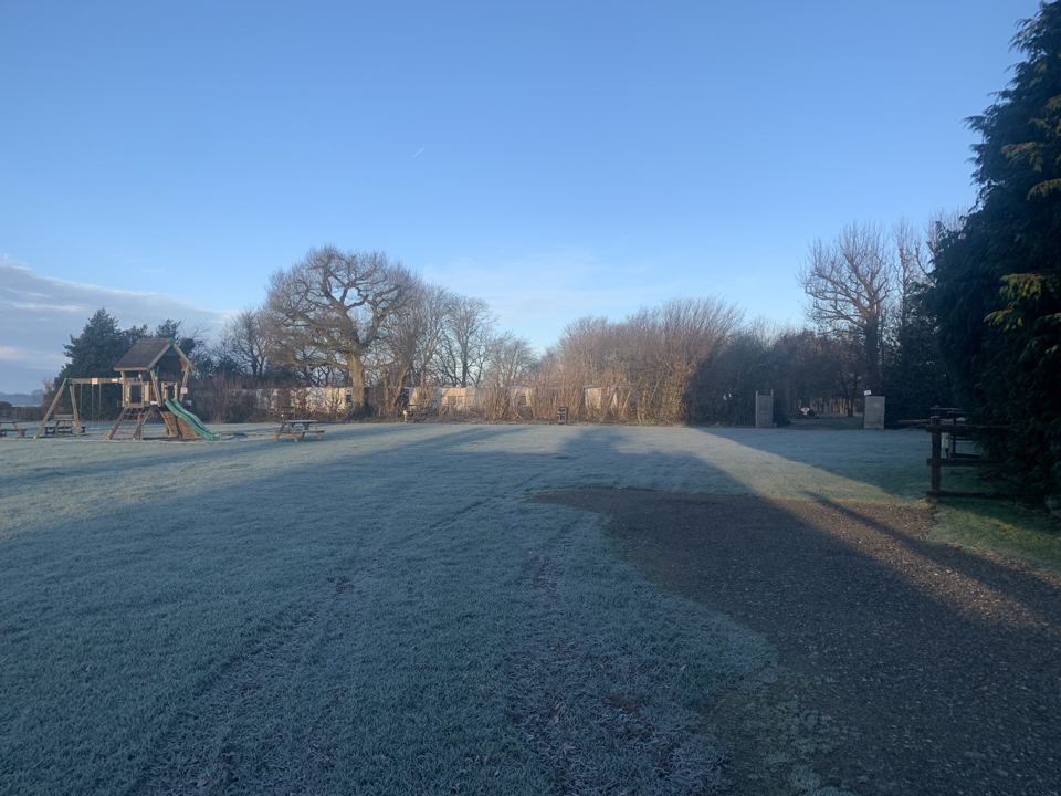 Frosty field and hardstanding