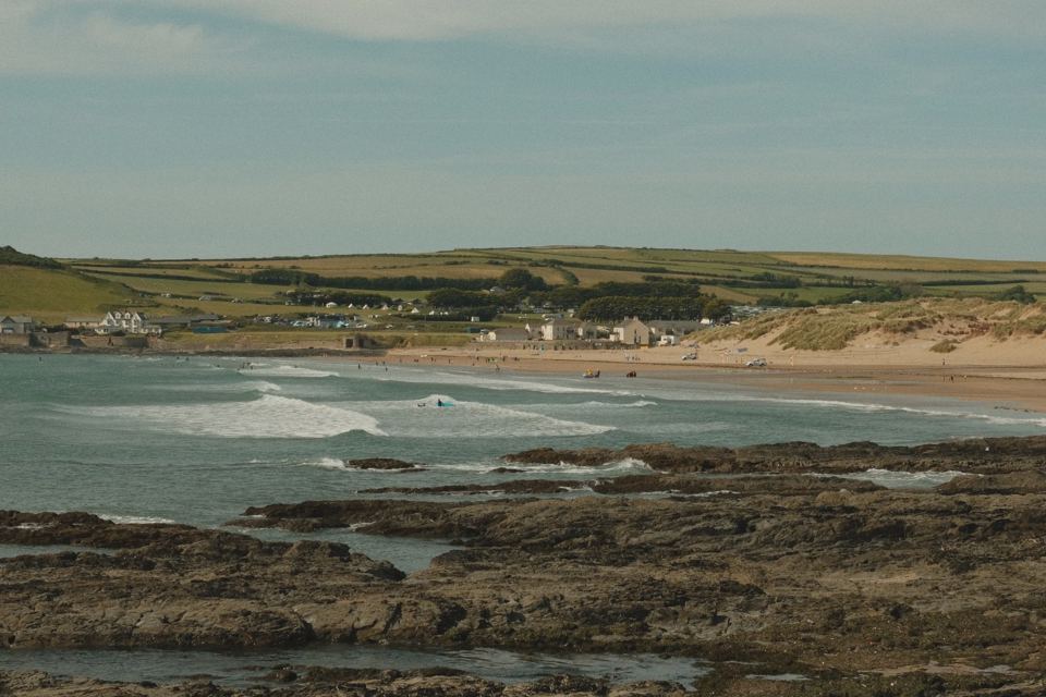 Surf and beach below the village