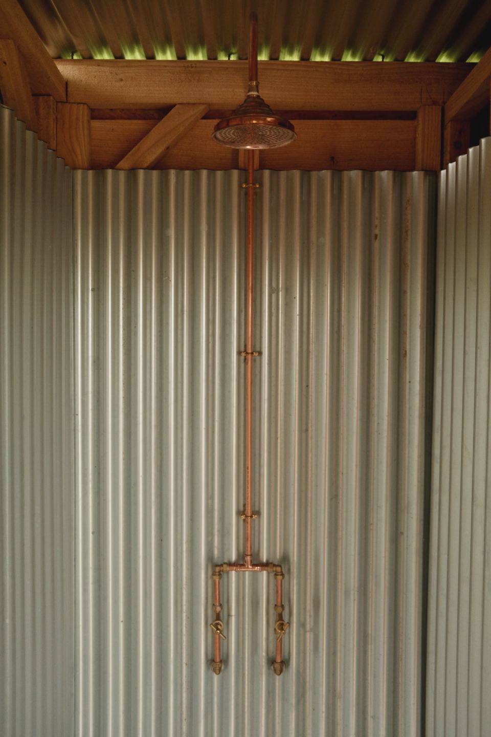 Outdoor shower on the wall