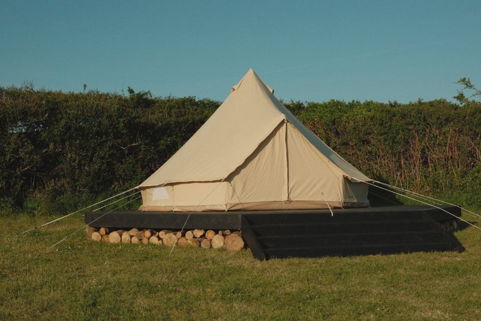Bell tent on a timber base