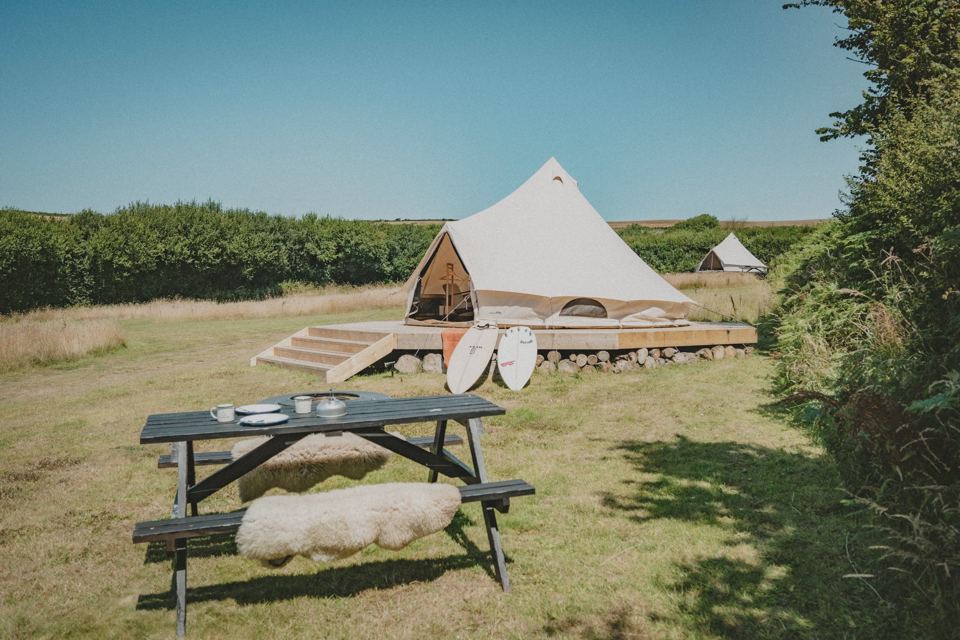 Bell tent with decking and picnic table