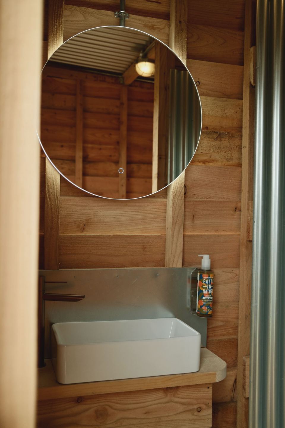 Inside the wooden shower room