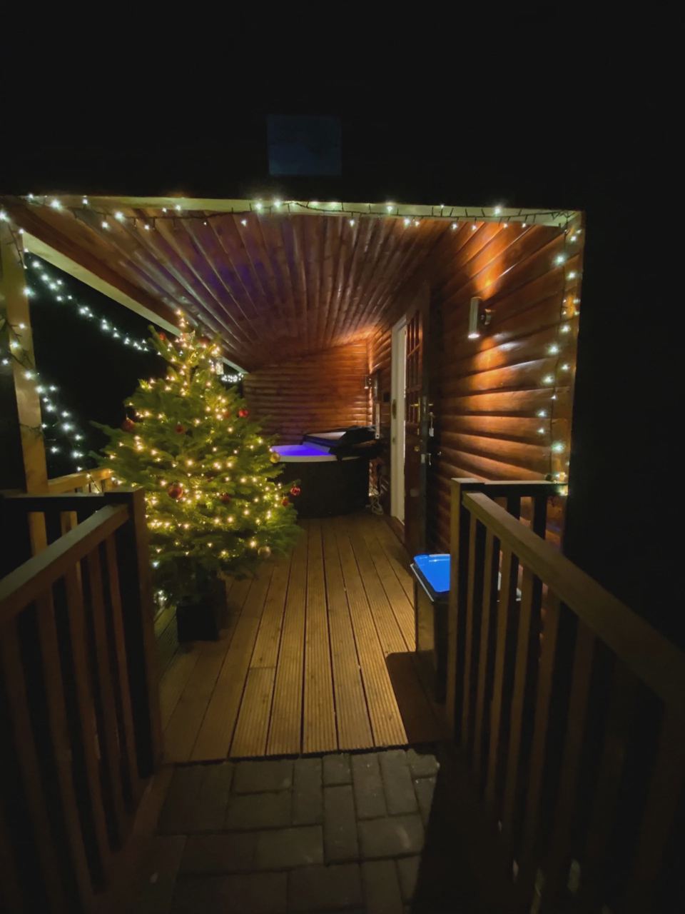 Lodge decking lit at night
