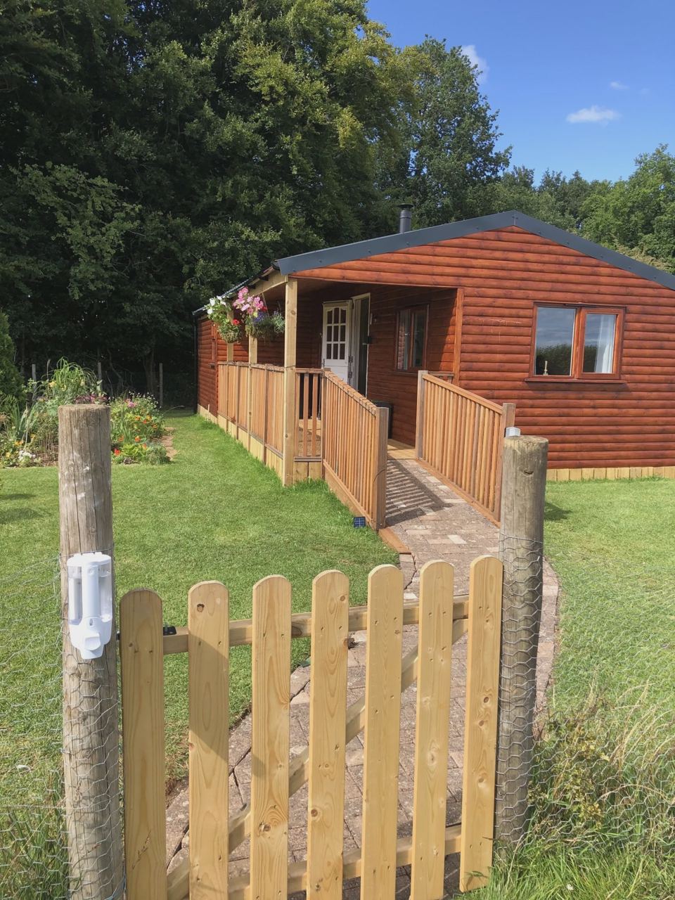 Lodge with ramp and picket fence