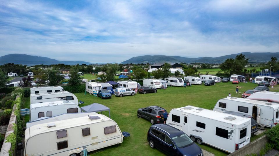 Touring field with mountain backdrop