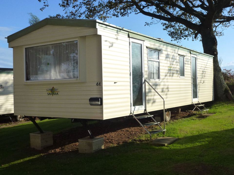 Sussex caravan by the trees