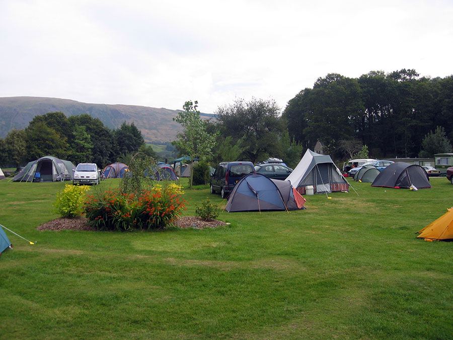 Tents with hills behind