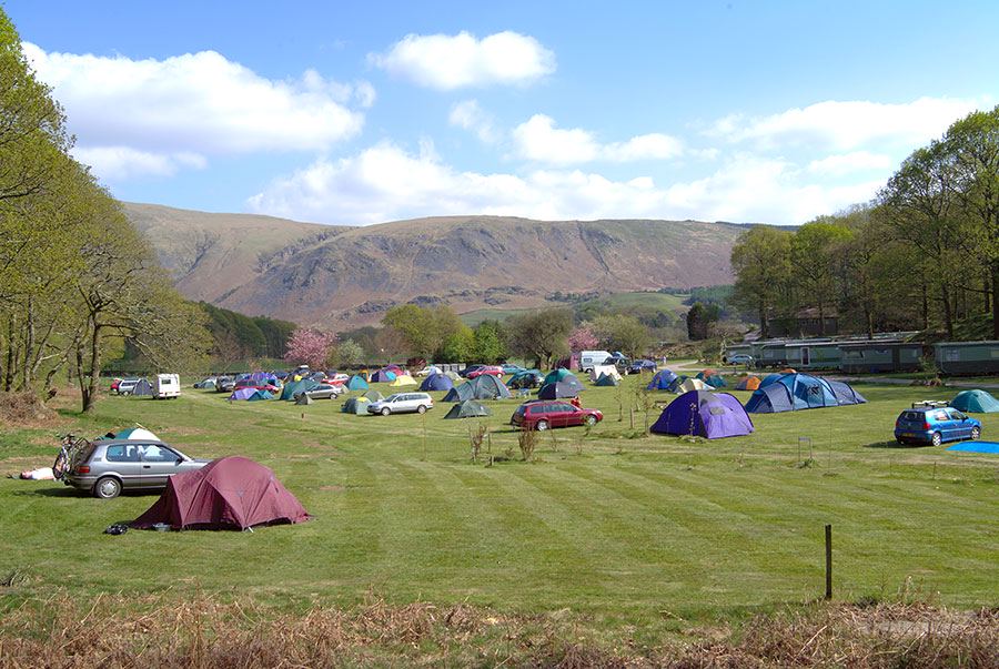 Tents in the field below the fells