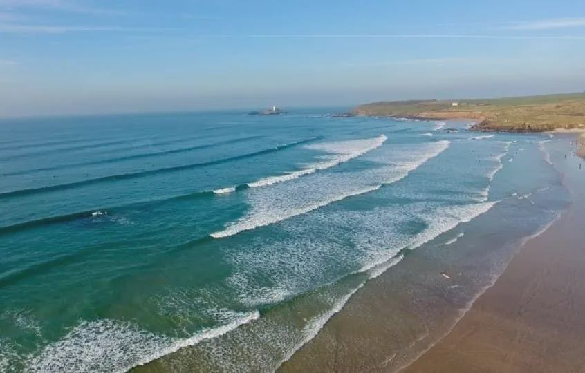 Surf rolling in on the beach