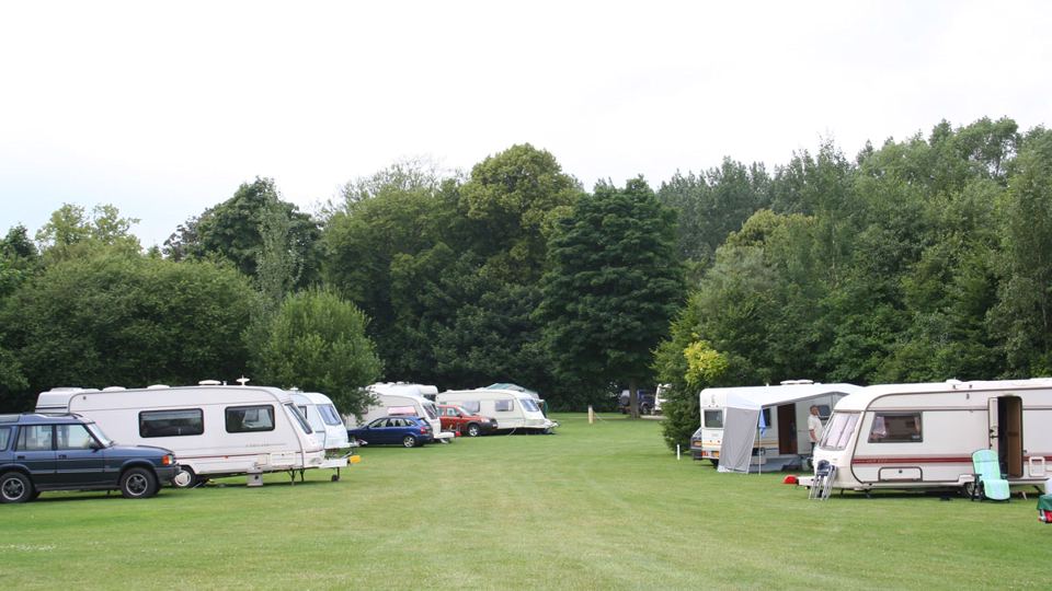 Caravans at the edge of the field