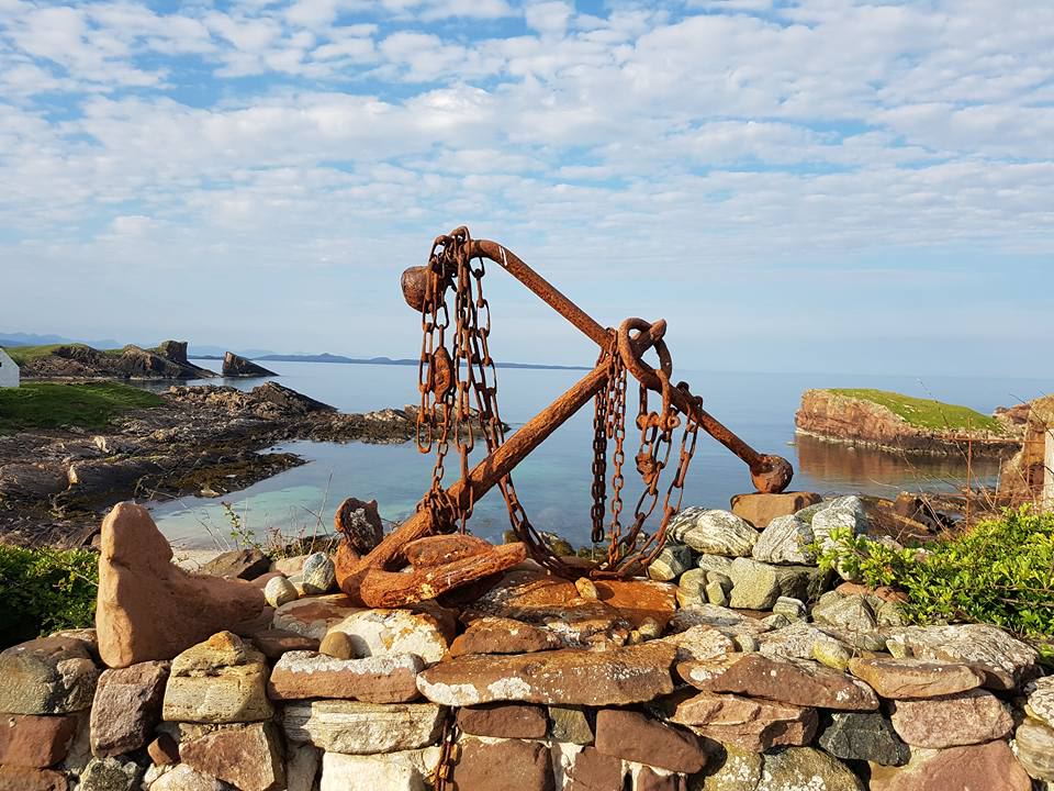 Old anchor above the bay
